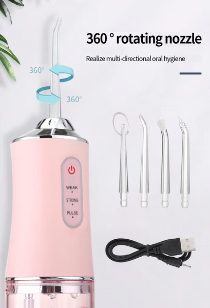 Ірригатор для порожнини рота ORAL IRRIGATOR 3 режими з насадками рожевий eve1283 фото