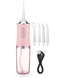 Ірригатор для порожнини рота ORAL IRRIGATOR 3 режими з насадками рожевий eve1283 фото 2
